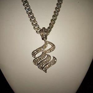 Brass chain with cz diamonds and rocawear charm